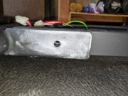 E95 Step 1-1 03 White dust on side of U-channel easily removed with damp rag; problem - holes are misaligned.jpg
