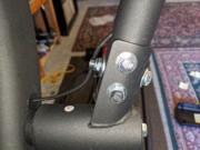 E95 Step 4-10 02 Pull & bend wire behind bolt end at left handle bar.jpg