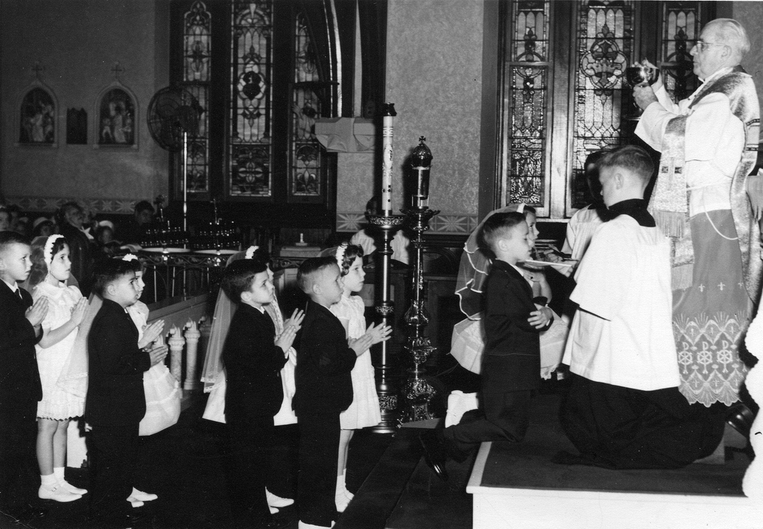 1962 2 John McWeeney & Karen, First Communion (next in line, bottom of steps).jpg