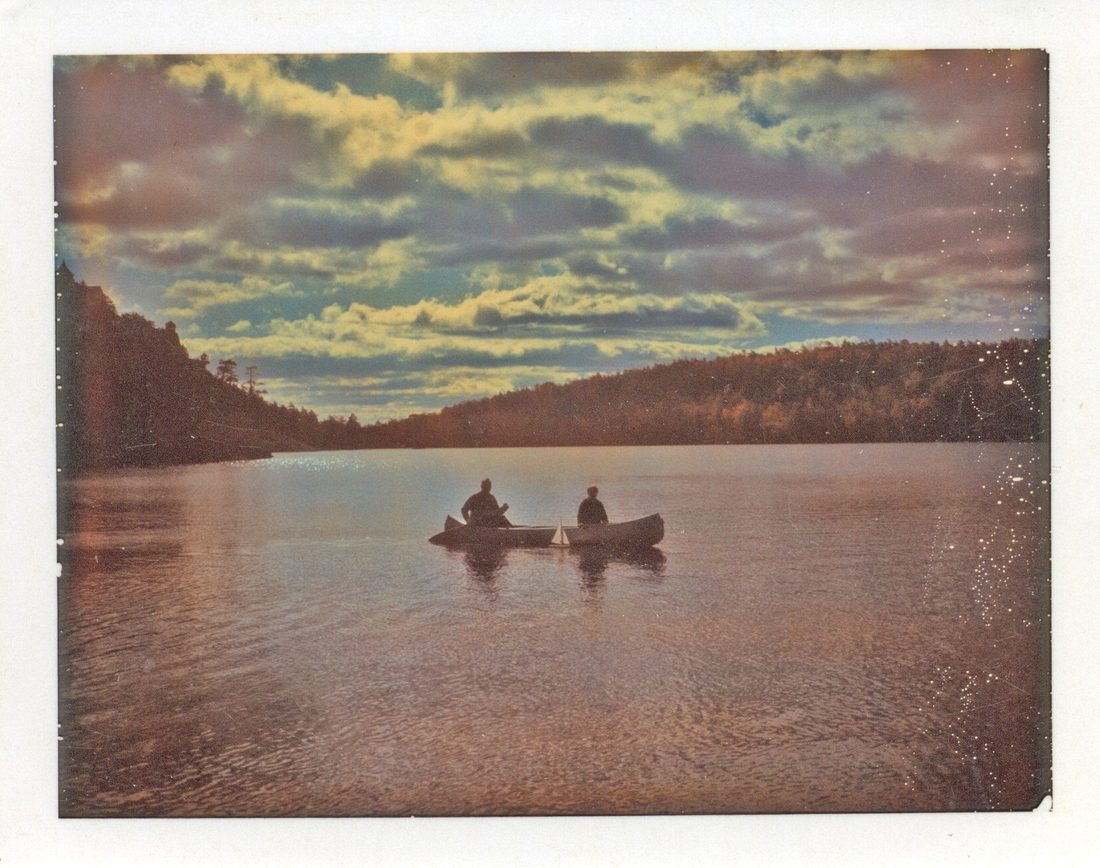 1967 Harry & Karen in canoe with toy sailboat; Lake Minnewaska.jpg