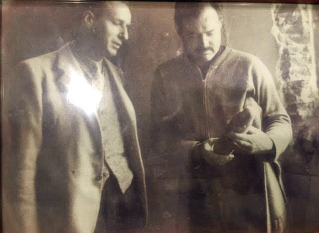 1937~ Herb & Ernest Hemingway with mortar round in Spain.jpg