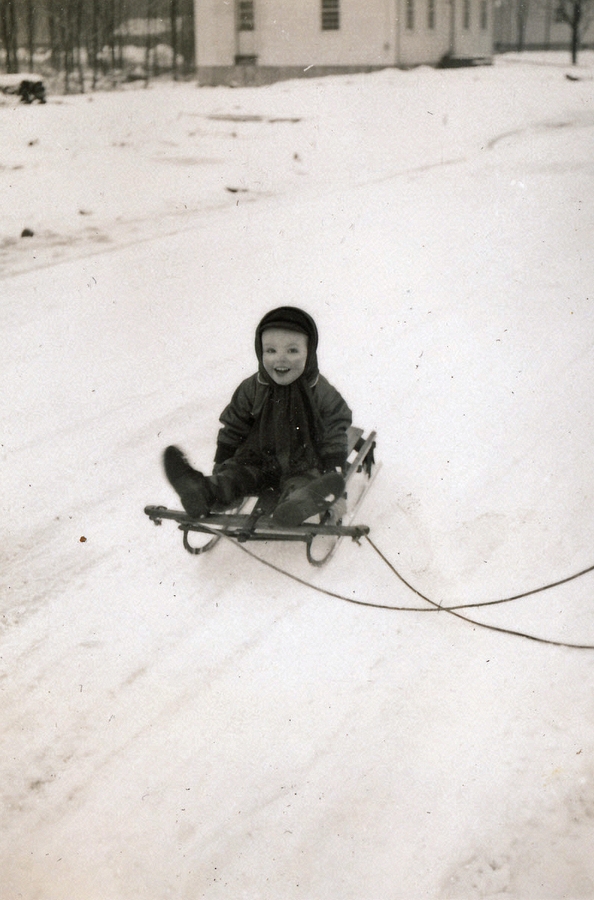 1951-01~ 3 Pete Jr gets a ride down the street.jpg