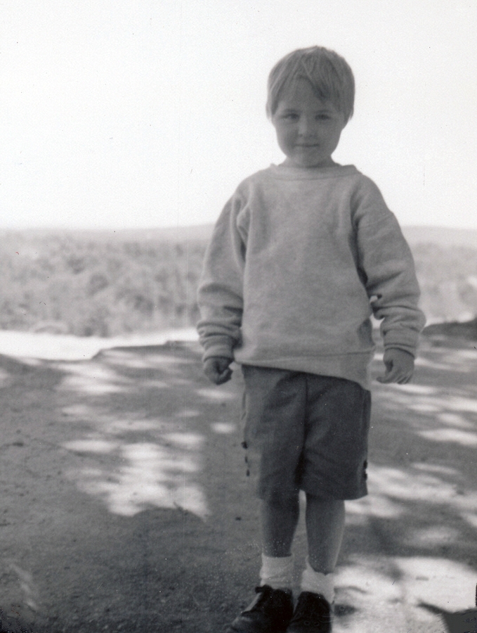 1960-08 17 Andrea, standing on the edge of a road cut off for the advance of a huge new resevoir near Dustin NH.jpg
