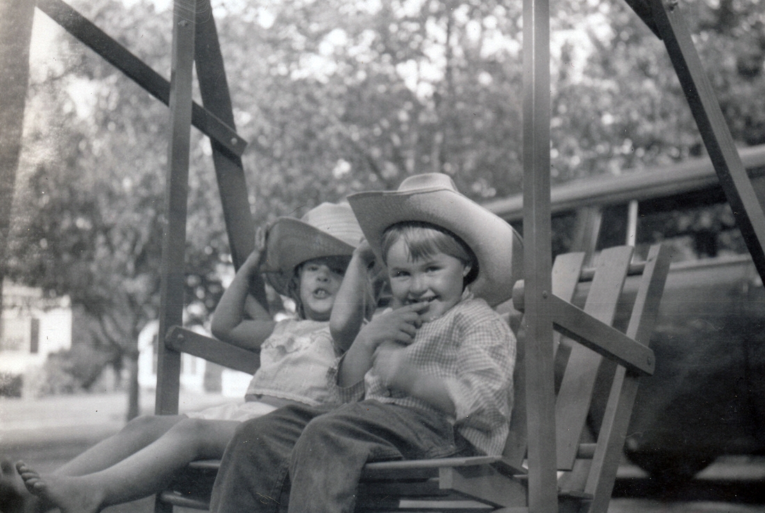 1960-08 32 Anne Rawson & Andrea Matthews - in the 'stage coach' - 204 Highgate St, Needham MA.jpg