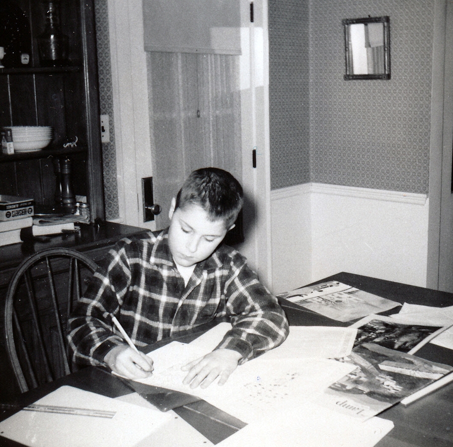 1961-04~ Dan working on a school report.jpg