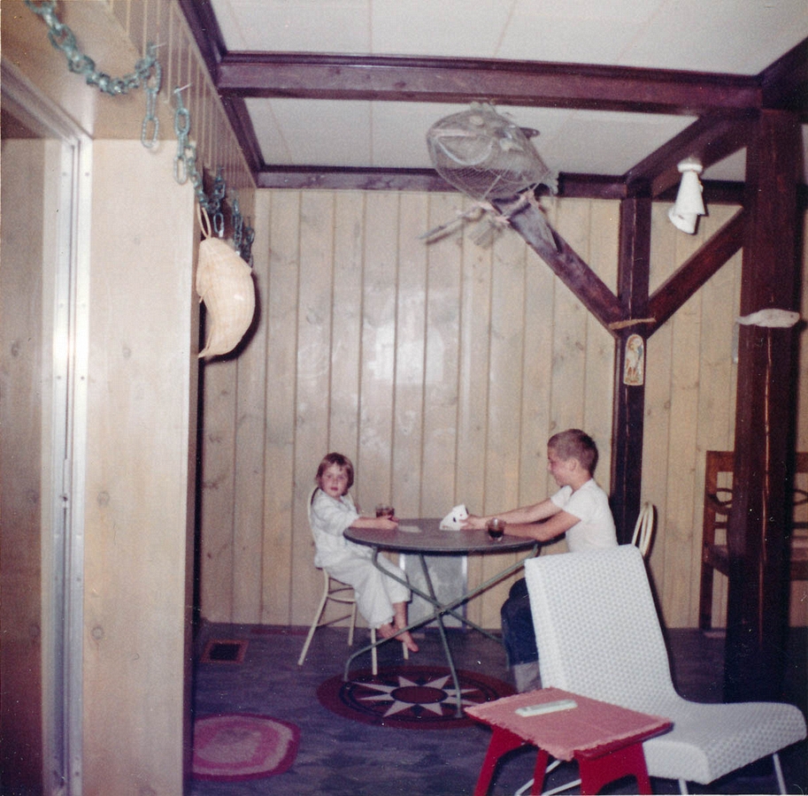 1961-09-03~ 06 Andrea & Dan - old maid and Dr Pepper -  in playroom, Islesboro ME.jpg