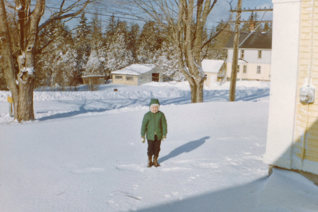 1962-12-30 4 Andrea in front yard, Alan Dodge's in background, Islesboro ME.jpg