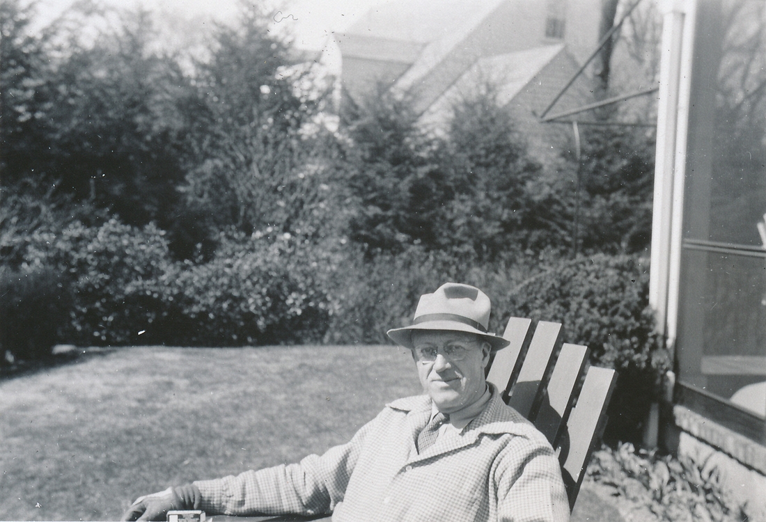 1946-03~ 05 Superintendent (in one of the Adirondack chairs he made).jpg