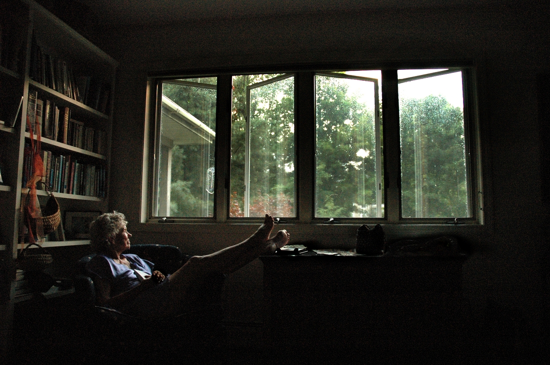 2007-08-25 Mom looking out rainy windows.jpg