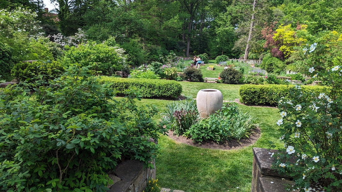 2023-05-12 206 Looking from roses to perennials, Herbaceous Teaching Garden; Barnes Arboretum, Merion PA.jpg